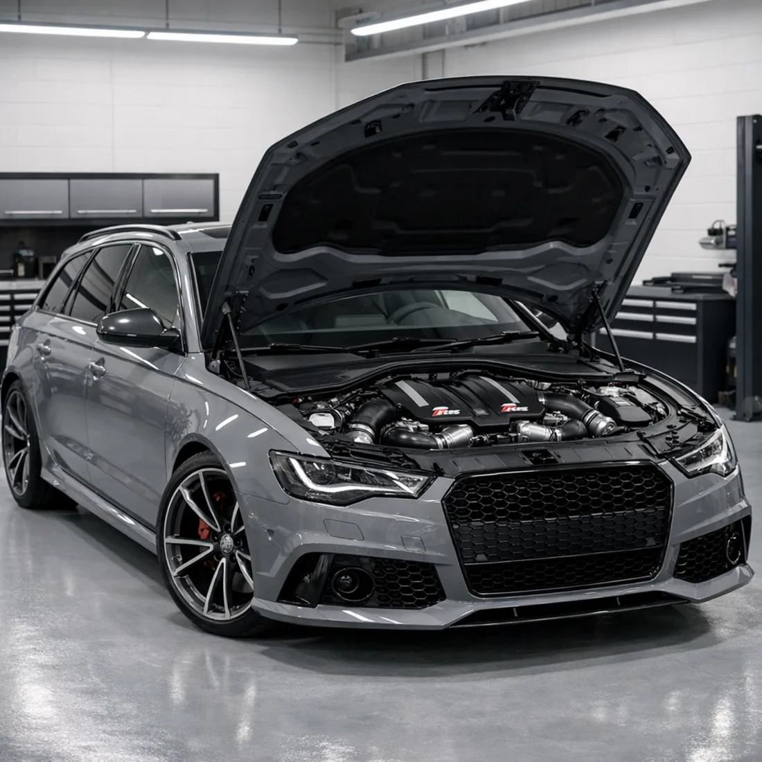 Audi RS6 C7 twin turbo V8 engine bay in workshop